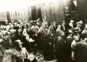 Prisoners from the first transport to KL Auschwitz at the train station in Tarnów